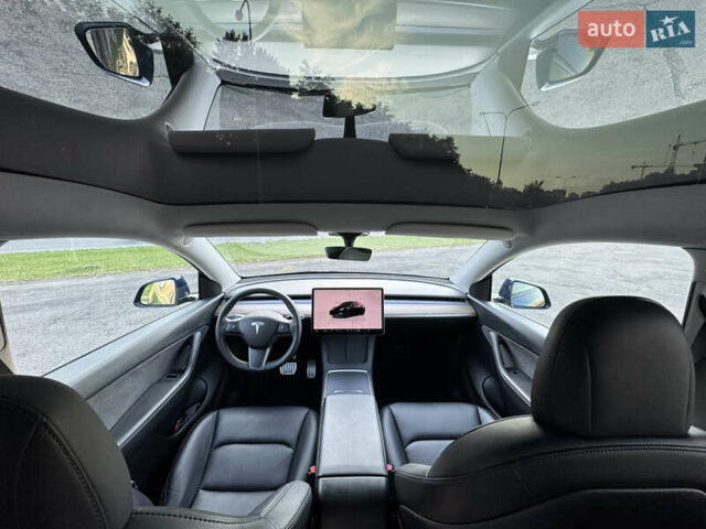 Синий Тесла Model Y, объемом двигателя 0 л и пробегом 61 тыс. км за 23800 $, фото 15 на Automoto.ua