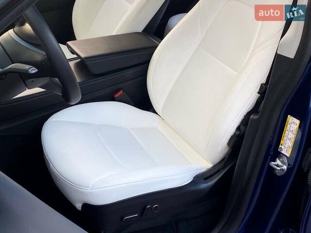 Синий Тесла Model Y, объемом двигателя 0 л и пробегом 92 тыс. км за 31999 $, фото 12 на Automoto.ua