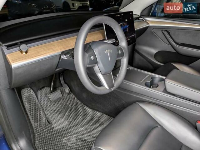 Синий Тесла Model Y, объемом двигателя 0 л и пробегом 51 тыс. км за 30900 $, фото 20 на Automoto.ua