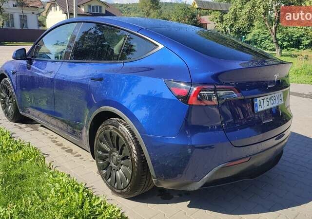 Синий Тесла Model Y, объемом двигателя 0 л и пробегом 54 тыс. км за 29900 $, фото 21 на Automoto.ua