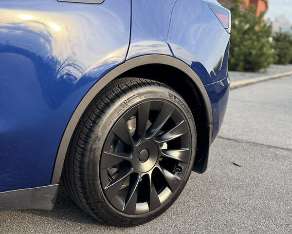 Синий Тесла Model Y, объемом двигателя 0 л и пробегом 52 тыс. км за 30900 $, фото 6 на Automoto.ua