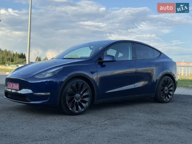 Синий Тесла Model Y, объемом двигателя 0 л и пробегом 61 тыс. км за 23800 $, фото 2 на Automoto.ua