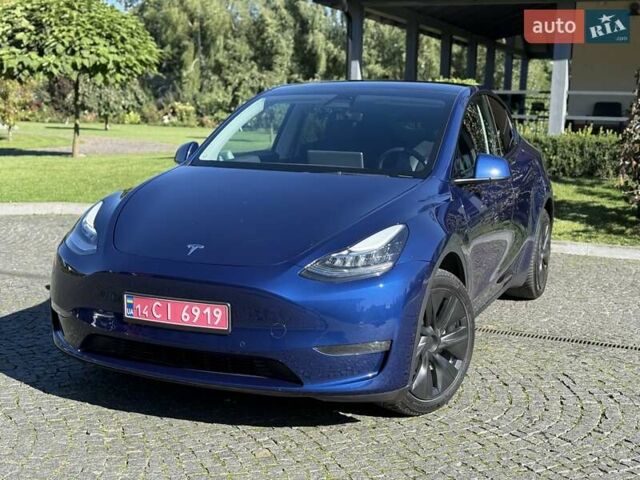 Синий Тесла Model Y, объемом двигателя 0 л и пробегом 80 тыс. км за 25300 $, фото 11 на Automoto.ua