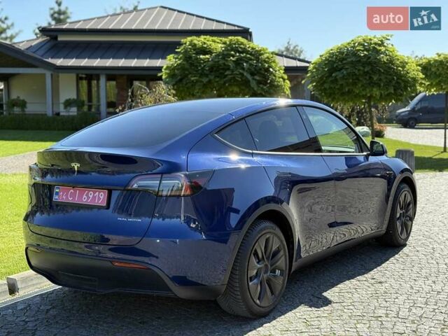 Синий Тесла Model Y, объемом двигателя 0 л и пробегом 80 тыс. км за 25300 $, фото 40 на Automoto.ua