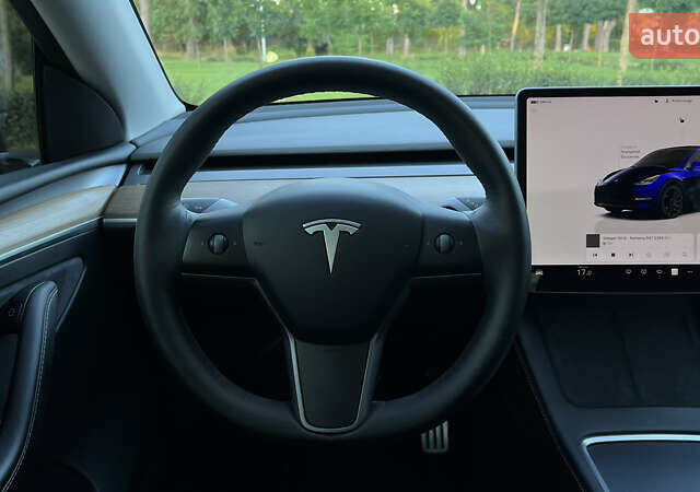 Синий Тесла Model Y, объемом двигателя 0 л и пробегом 84 тыс. км за 26900 $, фото 38 на Automoto.ua