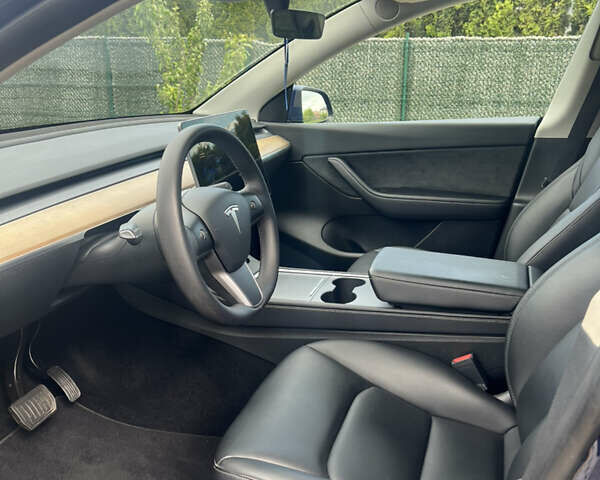 Синій Тесла Model Y, об'ємом двигуна 0 л та пробігом 91 тис. км за 23200 $, фото 14 на Automoto.ua