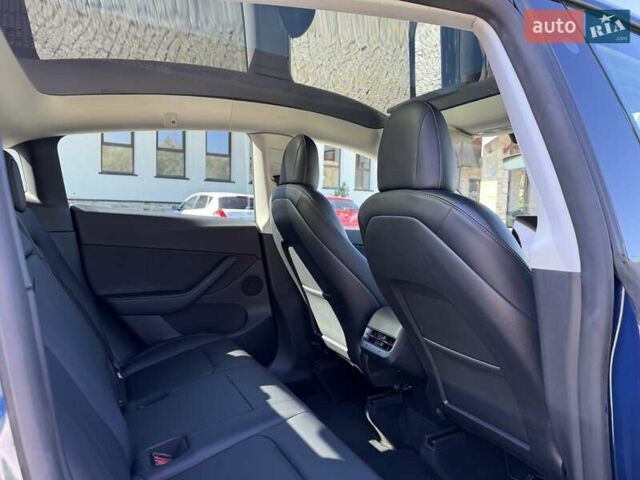 Синий Тесла Model Y, объемом двигателя 0 л и пробегом 80 тыс. км за 25300 $, фото 86 на Automoto.ua