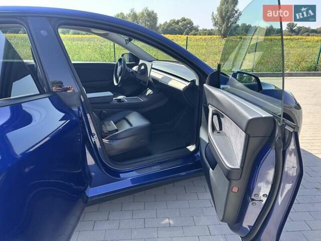Синий Тесла Model Y, объемом двигателя 0 л и пробегом 48 тыс. км за 26700 $, фото 14 на Automoto.ua