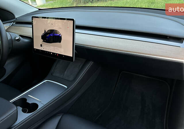 Синий Тесла Model Y, объемом двигателя 0 л и пробегом 84 тыс. км за 26900 $, фото 40 на Automoto.ua