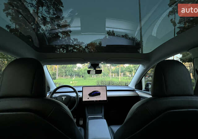 Синий Тесла Model Y, объемом двигателя 0 л и пробегом 84 тыс. км за 26900 $, фото 48 на Automoto.ua