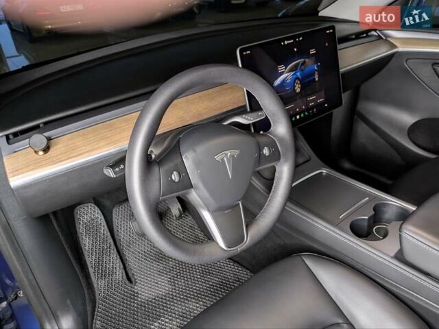 Синий Тесла Model Y, объемом двигателя 0 л и пробегом 51 тыс. км за 30900 $, фото 21 на Automoto.ua