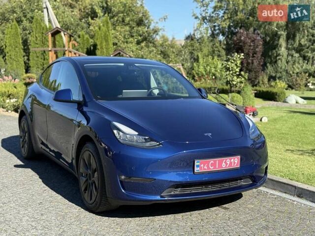 Синий Тесла Model Y, объемом двигателя 0 л и пробегом 80 тыс. км за 25300 $, фото 43 на Automoto.ua