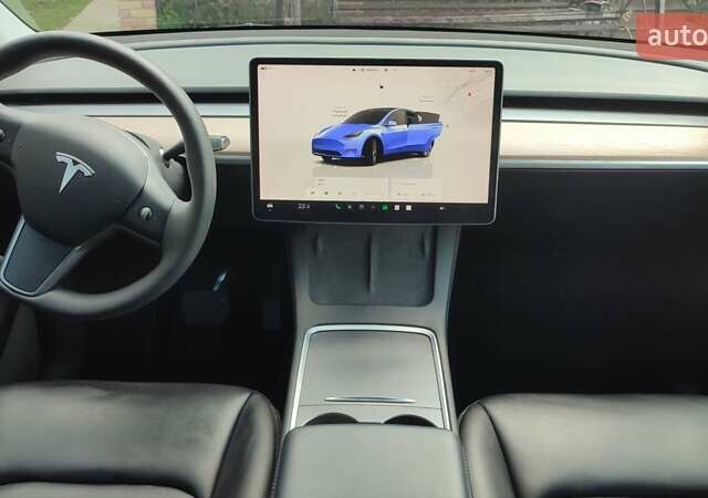 Синий Тесла Model Y, объемом двигателя 0 л и пробегом 54 тыс. км за 29900 $, фото 49 на Automoto.ua