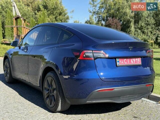Синий Тесла Model Y, объемом двигателя 0 л и пробегом 80 тыс. км за 25300 $, фото 32 на Automoto.ua