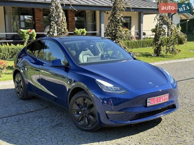 Синий Тесла Model Y, объемом двигателя 0 л и пробегом 80 тыс. км за 25300 $, фото 25 на Automoto.ua