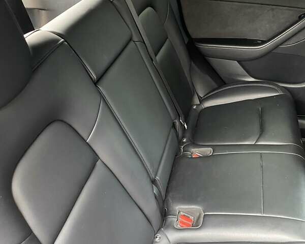 Синий Тесла Model Y, объемом двигателя 0 л и пробегом 89 тыс. км за 22000 $, фото 15 на Automoto.ua