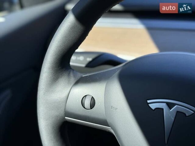 Синий Тесла Model Y, объемом двигателя 0 л и пробегом 80 тыс. км за 25300 $, фото 107 на Automoto.ua
