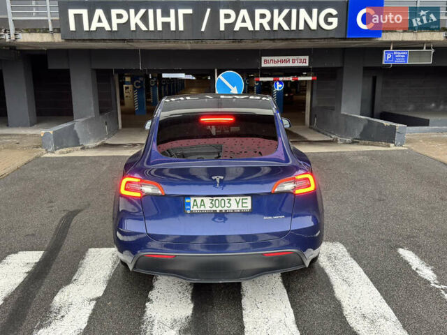 Синий Тесла Model Y, объемом двигателя 0 л и пробегом 104 тыс. км за 22900 $, фото 5 на Automoto.ua