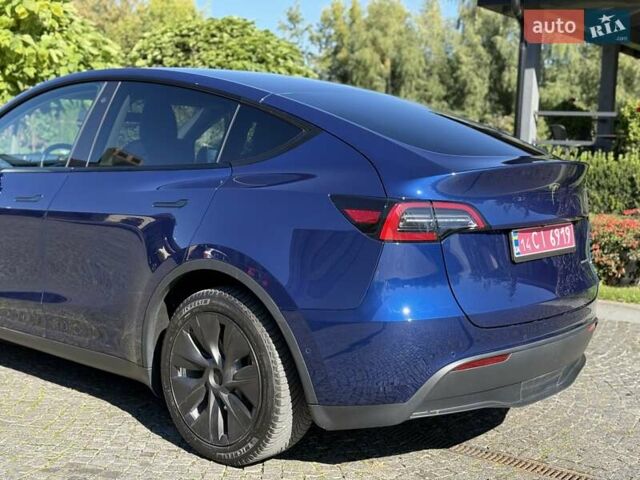Синий Тесла Model Y, объемом двигателя 0 л и пробегом 80 тыс. км за 25300 $, фото 62 на Automoto.ua