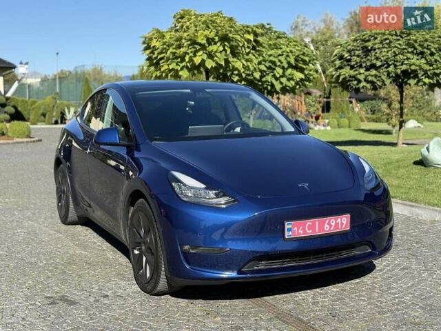 Синий Тесла Model Y, объемом двигателя 0 л и пробегом 80 тыс. км за 25300 $, фото 2 на Automoto.ua
