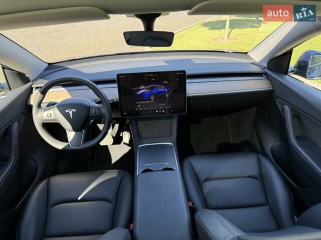 Синий Тесла Model Y, объемом двигателя 0 л и пробегом 80 тыс. км за 25300 $, фото 101 на Automoto.ua