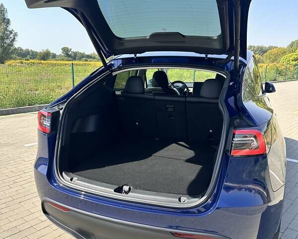Синий Тесла Model Y, объемом двигателя 0 л и пробегом 48 тыс. км за 26700 $, фото 12 на Automoto.ua