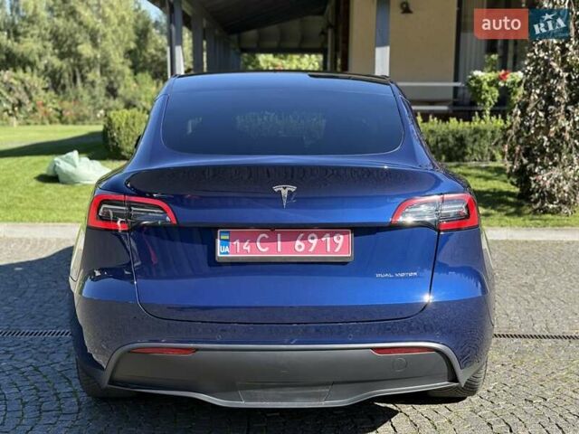Синий Тесла Model Y, объемом двигателя 0 л и пробегом 80 тыс. км за 25300 $, фото 57 на Automoto.ua