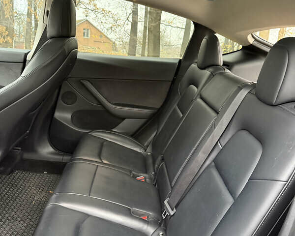 Синий Тесла Model Y, объемом двигателя 0 л и пробегом 133 тыс. км за 23900 $, фото 15 на Automoto.ua