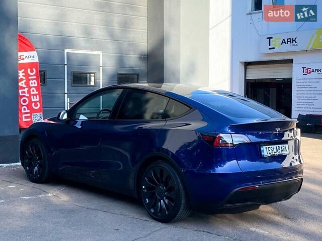 Синий Тесла Model Y, объемом двигателя 0 л и пробегом 92 тыс. км за 31999 $, фото 7 на Automoto.ua