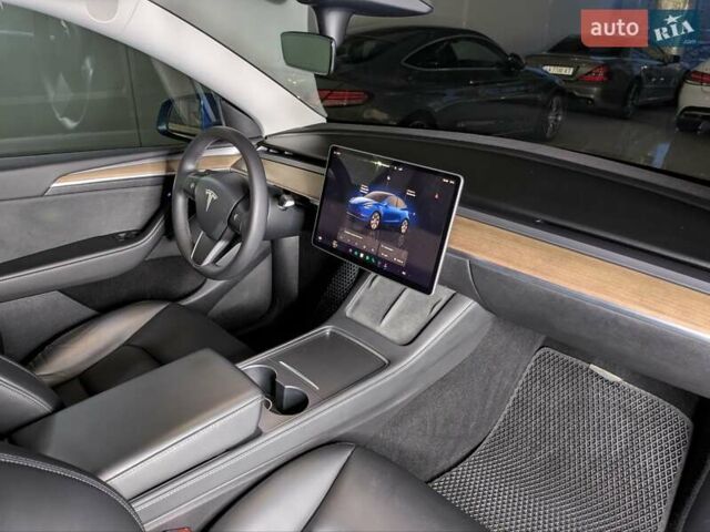Синий Тесла Model Y, объемом двигателя 0 л и пробегом 51 тыс. км за 30900 $, фото 45 на Automoto.ua