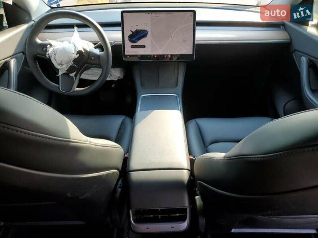 Синий Тесла Model Y, объемом двигателя 0 л и пробегом 52 тыс. км за 24990 $, фото 7 на Automoto.ua