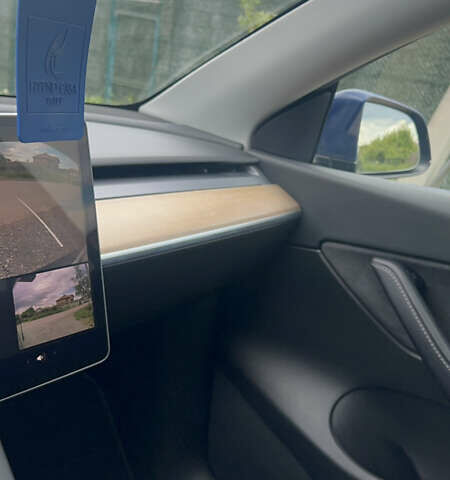 Синій Тесла Model Y, об'ємом двигуна 0 л та пробігом 91 тис. км за 23200 $, фото 25 на Automoto.ua