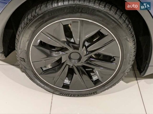 Синий Тесла Model Y, объемом двигателя 0 л и пробегом 51 тыс. км за 30900 $, фото 15 на Automoto.ua
