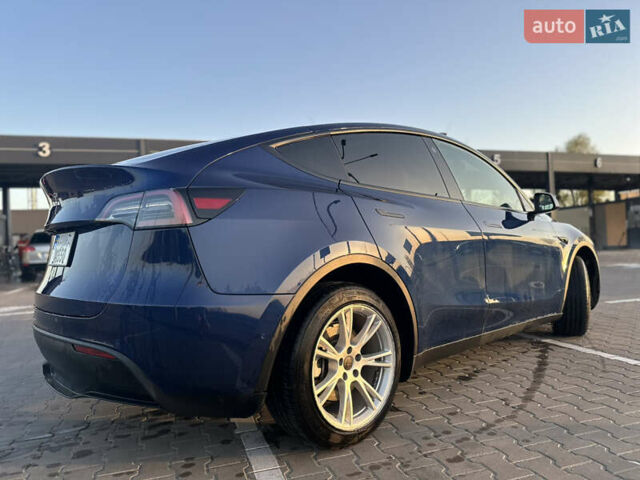 Синий Тесла Model Y, объемом двигателя 0 л и пробегом 86 тыс. км за 25000 $, фото 1 на Automoto.ua