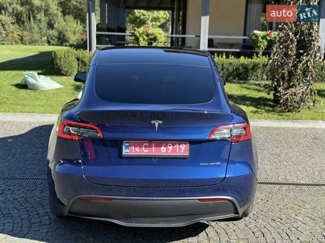 Синий Тесла Model Y, объемом двигателя 0 л и пробегом 80 тыс. км за 25300 $, фото 58 на Automoto.ua
