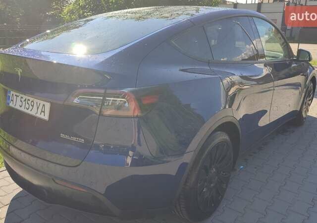 Синий Тесла Model Y, объемом двигателя 0 л и пробегом 54 тыс. км за 29900 $, фото 17 на Automoto.ua