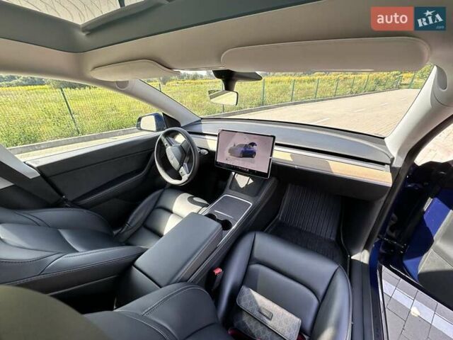 Синий Тесла Model Y, объемом двигателя 0 л и пробегом 48 тыс. км за 26700 $, фото 26 на Automoto.ua