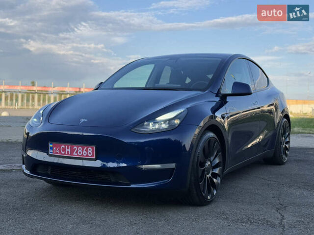 Синий Тесла Model Y, объемом двигателя 0 л и пробегом 61 тыс. км за 23800 $, фото 1 на Automoto.ua