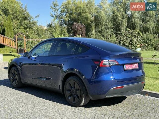 Синий Тесла Model Y, объемом двигателя 0 л и пробегом 80 тыс. км за 25300 $, фото 30 на Automoto.ua