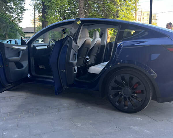 Синий Тесла Model Y, объемом двигателя 0 л и пробегом 28 тыс. км за 32900 $, фото 26 на Automoto.ua
