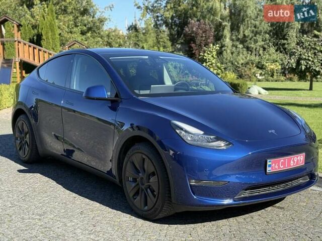 Синий Тесла Model Y, объемом двигателя 0 л и пробегом 80 тыс. км за 25300 $, фото 42 на Automoto.ua