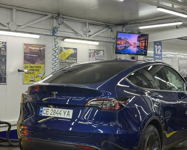 Синій Тесла Model Y, об'ємом двигуна 0 л та пробігом 68 тис. км за 25700 $, фото 39 на Automoto.ua