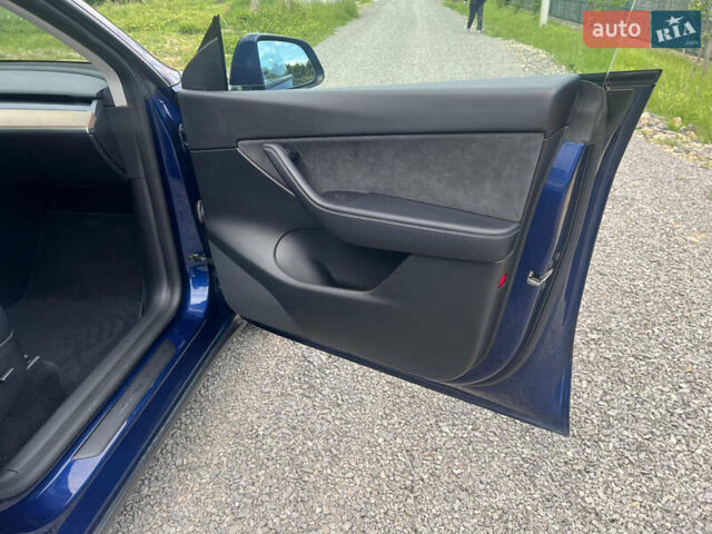 Синій Тесла Model Y, об'ємом двигуна 0 л та пробігом 91 тис. км за 23200 $, фото 20 на Automoto.ua