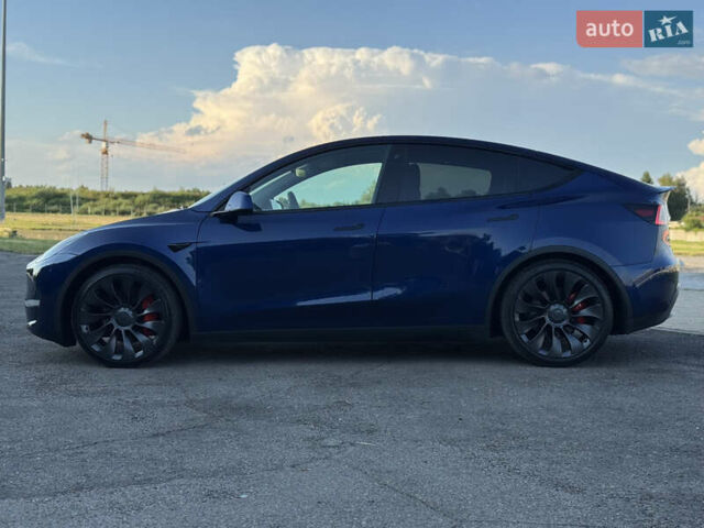 Синий Тесла Model Y, объемом двигателя 0 л и пробегом 61 тыс. км за 23800 $, фото 3 на Automoto.ua