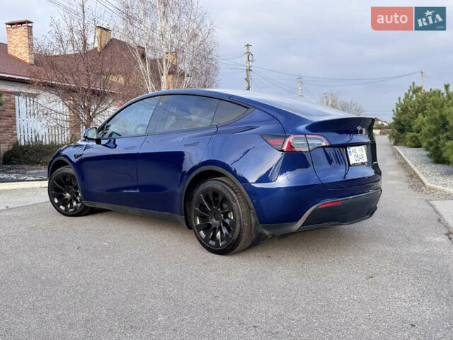 Синий Тесла Model Y, объемом двигателя 0 л и пробегом 52 тыс. км за 30900 $, фото 11 на Automoto.ua