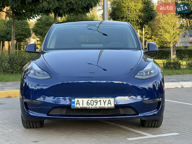 Синий Тесла Model Y, объемом двигателя 0 л и пробегом 84 тыс. км за 26900 $, фото 4 на Automoto.ua