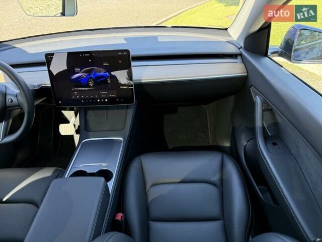 Синий Тесла Model Y, объемом двигателя 0 л и пробегом 80 тыс. км за 25300 $, фото 104 на Automoto.ua
