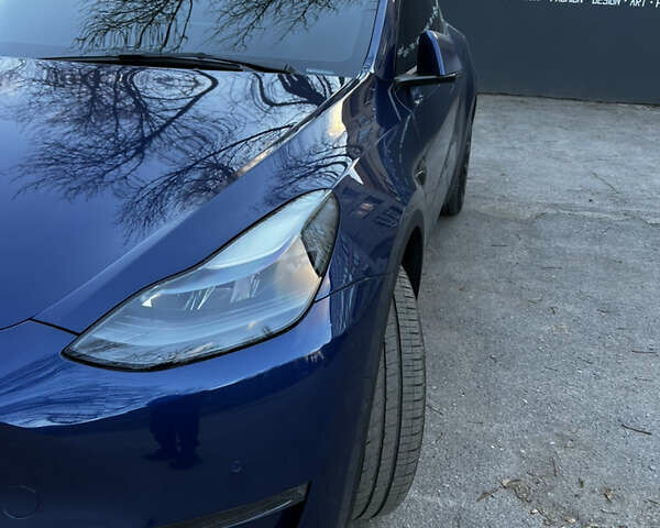 Синій Тесла Model Y, об'ємом двигуна 0 л та пробігом 76 тис. км за 23300 $, фото 10 на Automoto.ua