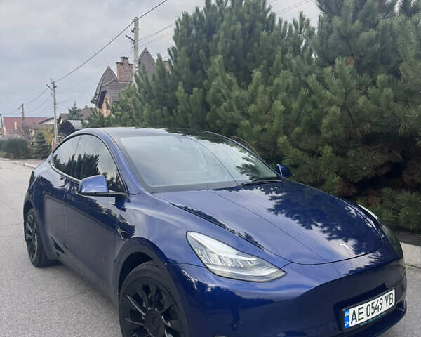 Синий Тесла Model Y, объемом двигателя 0 л и пробегом 52 тыс. км за 30900 $, фото 51 на Automoto.ua