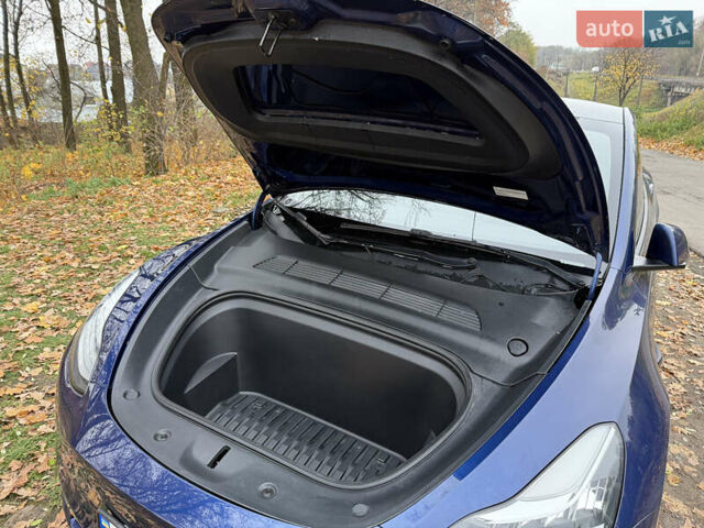 Синий Тесла Model Y, объемом двигателя 0 л и пробегом 133 тыс. км за 23900 $, фото 16 на Automoto.ua